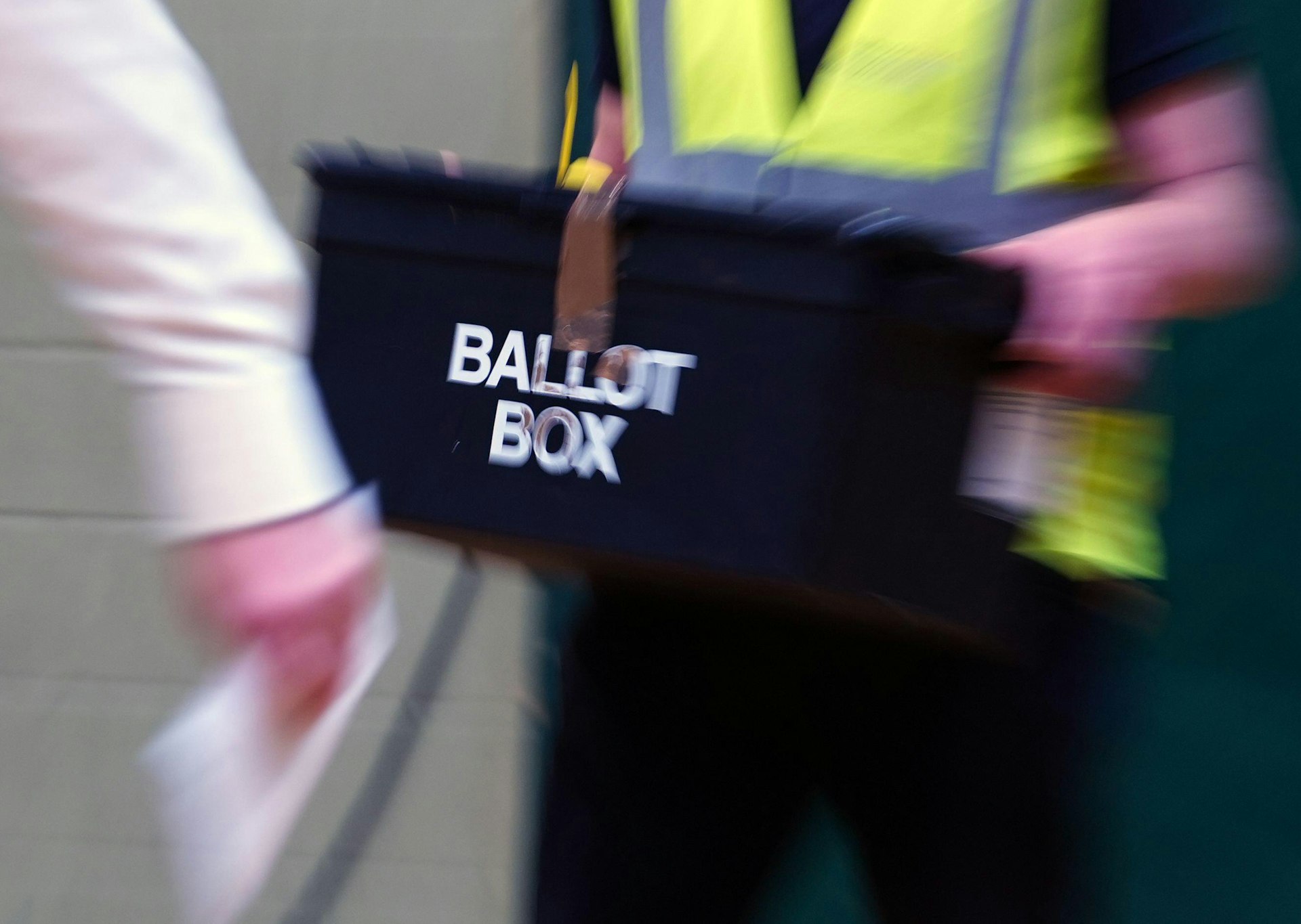 Ballot box being taken away